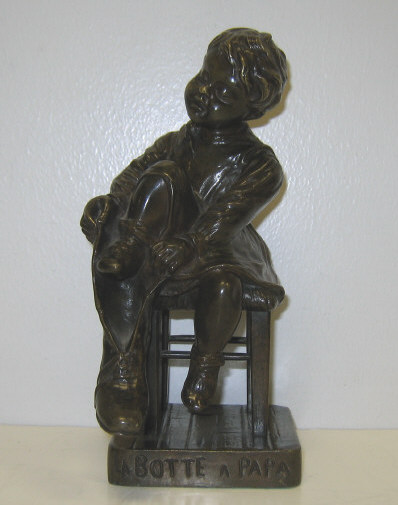 Appraisal: HENRI FUGERE FRENCH - Cast bronze figure of child putting