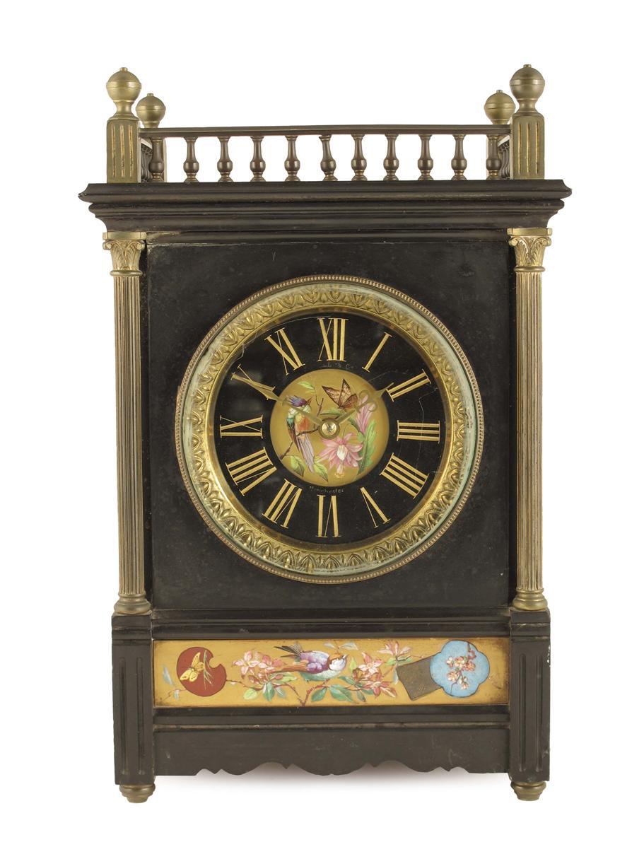 Appraisal: An Aesthetic Movement black marble and brass mounted mantel clock