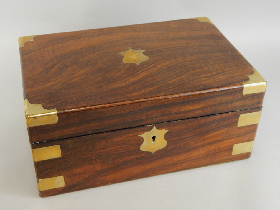 Appraisal: A Victorian walnut and brass bound writing box with a