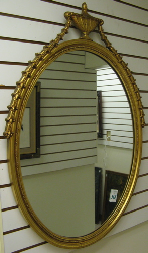 Appraisal: TWO AMERICAN WALL MIRRORS oval Federal style mirror the molded