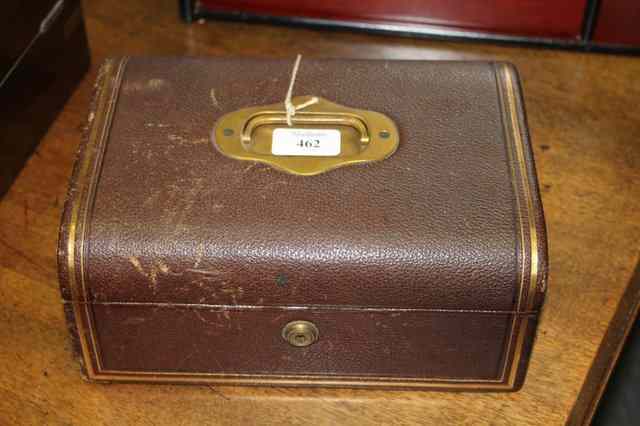 Appraisal: A VICTORIAN LEATHER JEWELLERY BOX with fitted interior together with