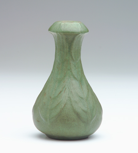 Appraisal: VAN BRIGGLE Bottle-shaped vase embossed with leaf decoration under a