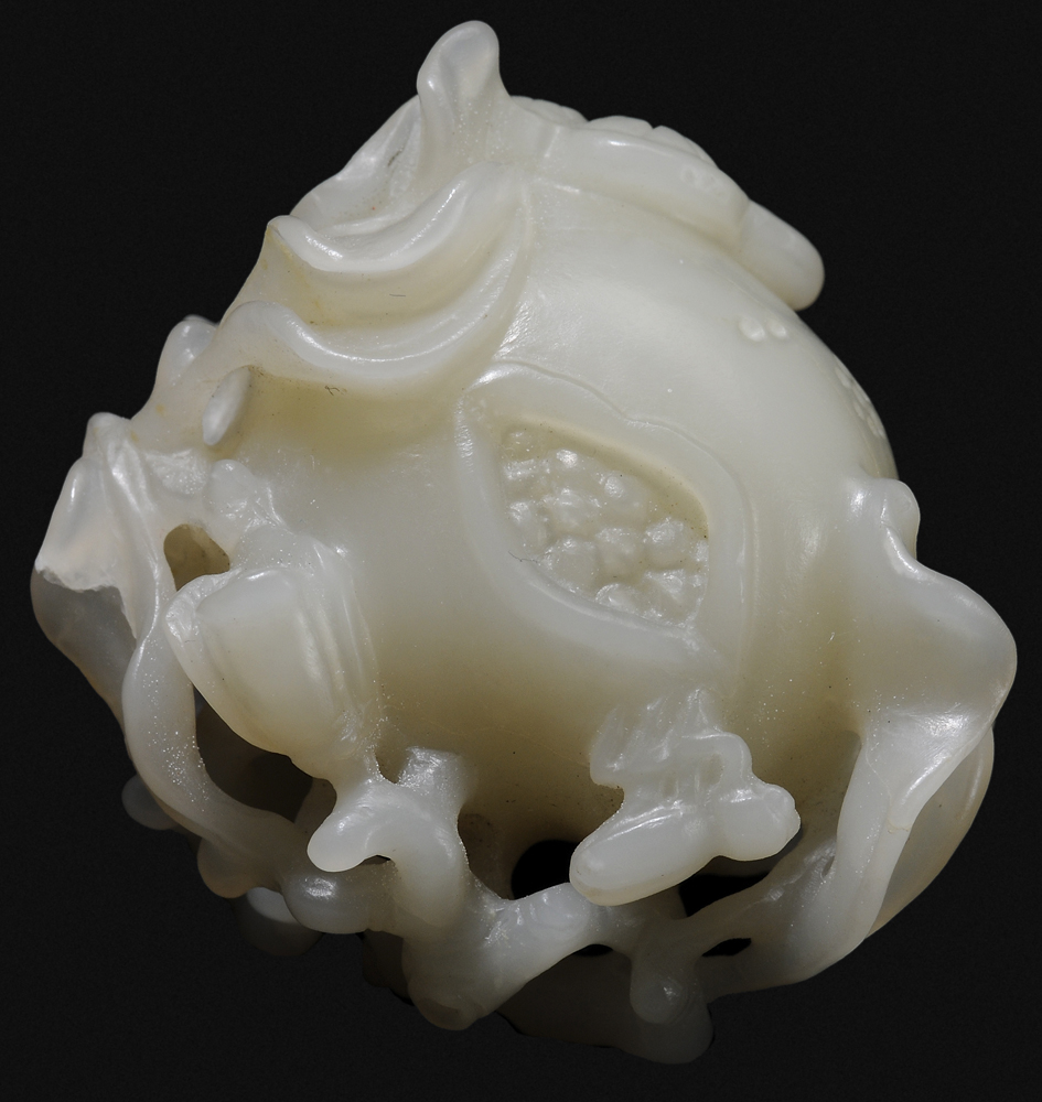 Appraisal: Jade Pomegranate Chinese th century or earlier pomegranate or seed