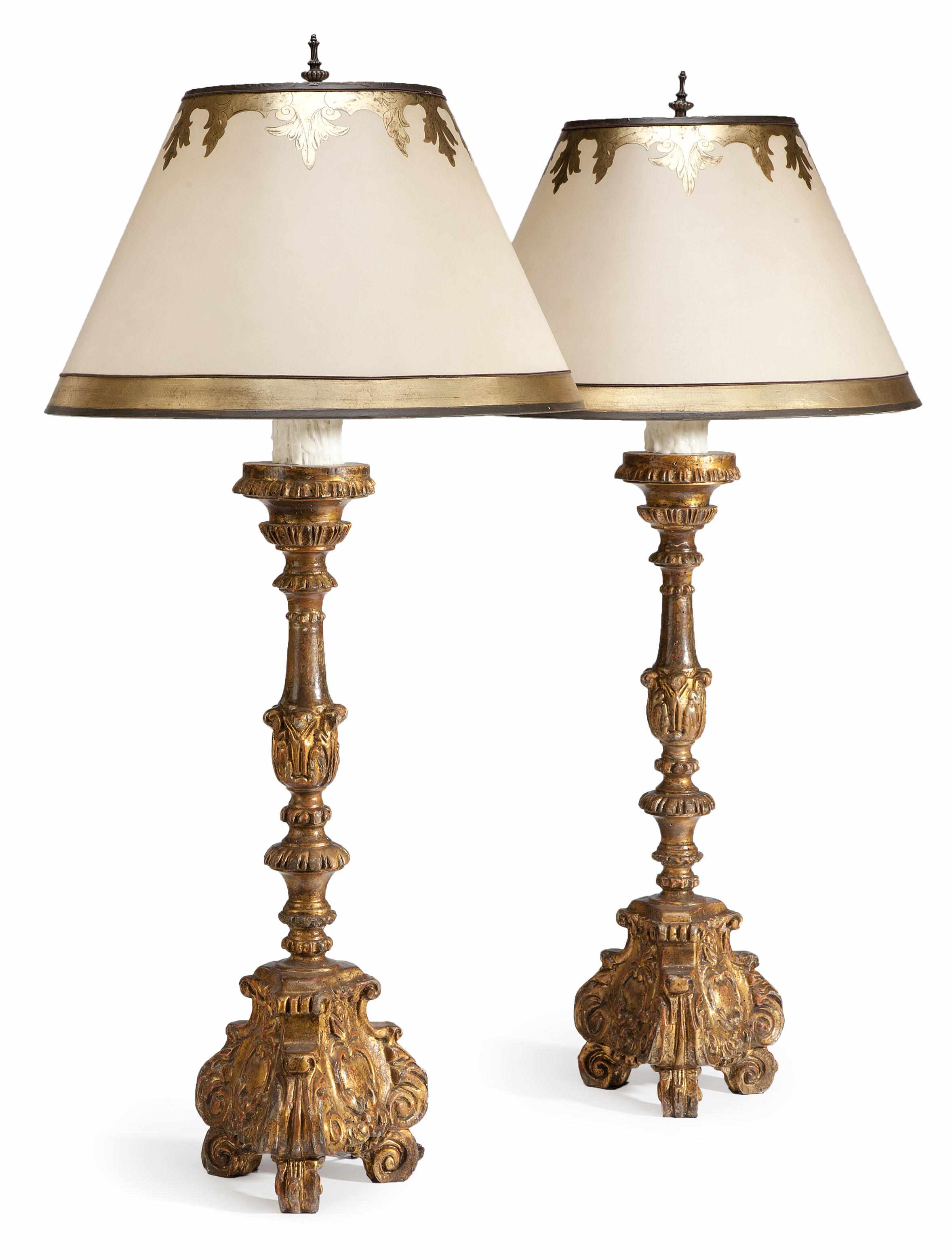 Appraisal: A pair of Italian Baroque style carved giltwood table lamps