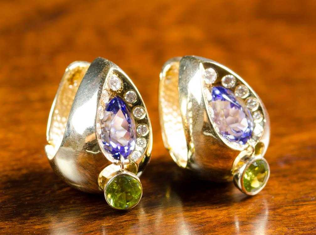 Appraisal: PAIR OF TANZANITE AND PERIDOT EARRINGS each k yellow gold