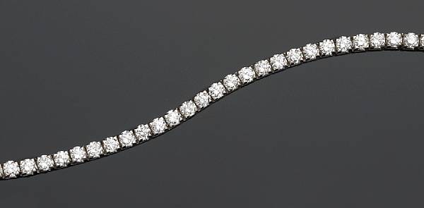 Appraisal: A diamond and eighteen karat white gold line bracelet the