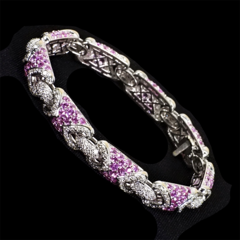 Appraisal: K GOLD PINK SAPPHIRE DIAMOND BRACELET brilliant cut pink sapphires