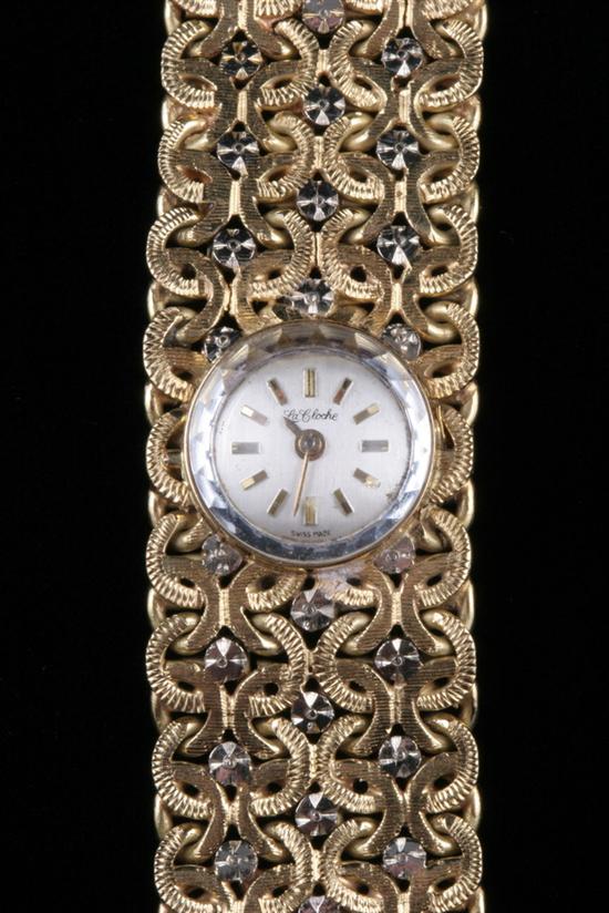 Appraisal: LADY'S K YELLOW AND WHITE GOLD BRACELET STYLE WRISTWATCH Round