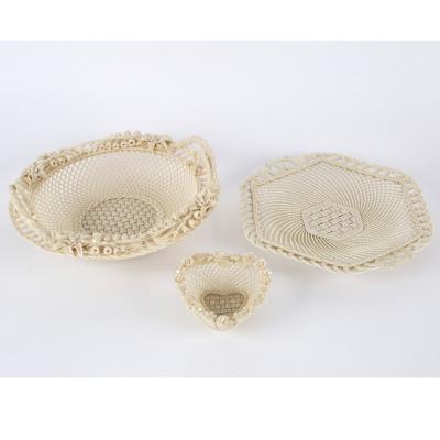 Appraisal: A Belleek circular two-handled basket another heart-shaped example and a