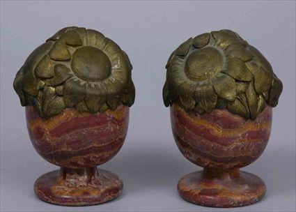 Appraisal: PAIR OF ART DECO GILT-BRONZE-MOUNTED MARBLE FINIALS Each cast as