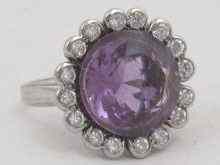 Appraisal: A white metal tests platinum amethyst and diamond dress ring