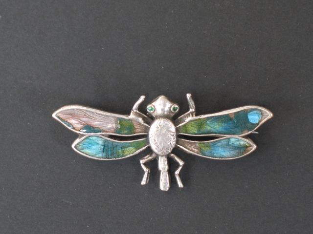 Appraisal: A STERLING SILVER AND ENAMELLED BROOCH in the form of