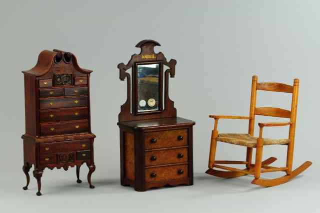 Appraisal: LOT OF THREE MINIATURE FURNITURE PIECES Grouping includes wooden rocking