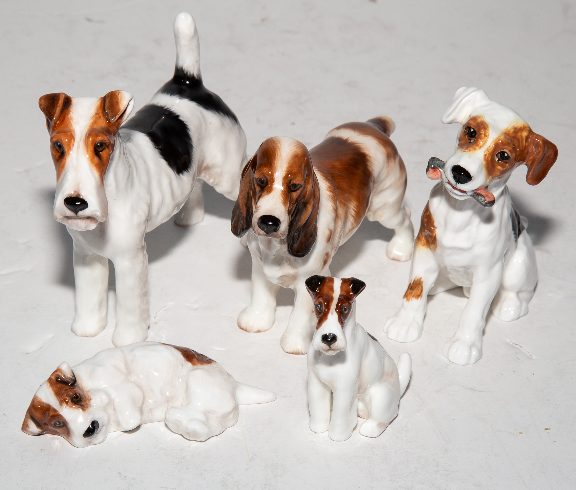 Appraisal: FIVE ROYAL DOULTON DOG FIGURES