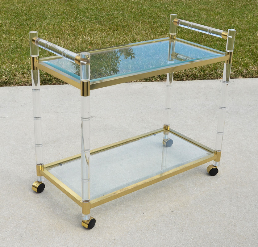 Appraisal: CHARLES HOLLIS JONES BRASS LUCITE SERVING CART Lucite with bamboo