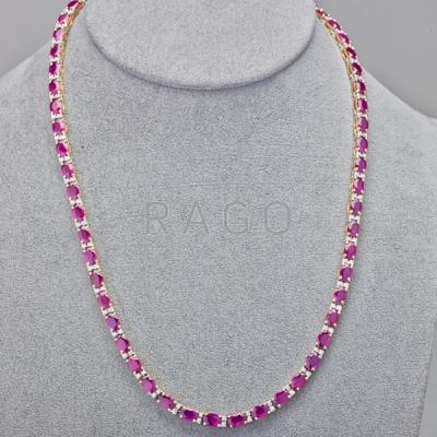 Appraisal: RUBY AND DIAMOND K GOLD NECKLACE oval faceted rubies on