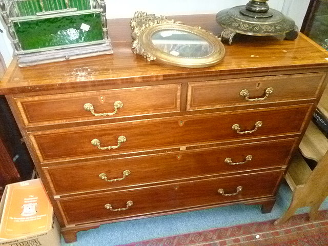 Appraisal: A GEORGIAN MAHOGANY CHEST of two short and three long