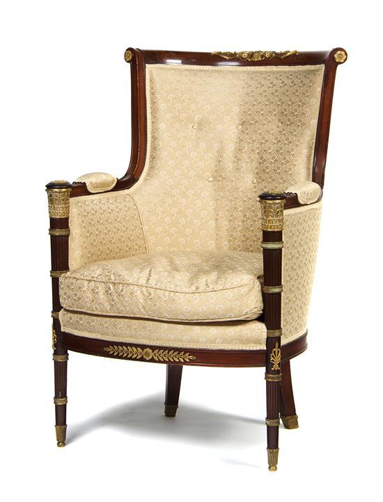 Appraisal: n Empire Style Mahogany and Gilt Metal Mounted Bergere having