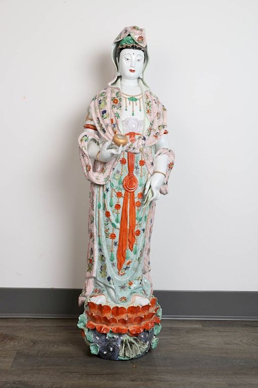 Appraisal: LARGE FAMILLE ROSE STANDING FIGURE OF GUANYIN Depicting a standing