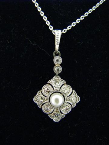 Appraisal: A lady's Edwardian platinum and K yellow gold pendant with