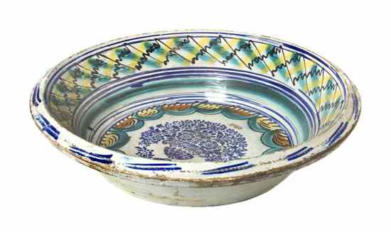 Appraisal: A Continental Ceramic Tin Glazed Basin of circular form the