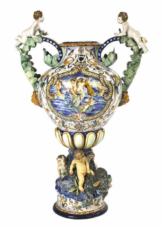 Appraisal: An Italian Faience Ceramic Urn of baluster handled form with