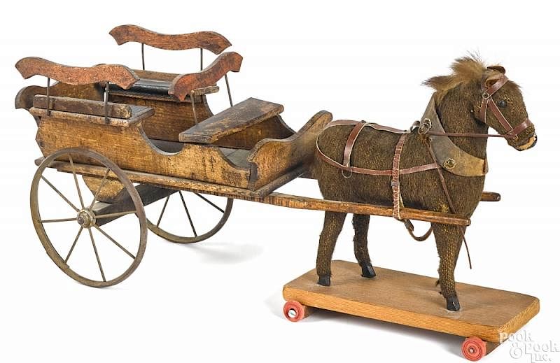 Appraisal: Horse drawn wagon pull toy Horse drawn wagon pull toy