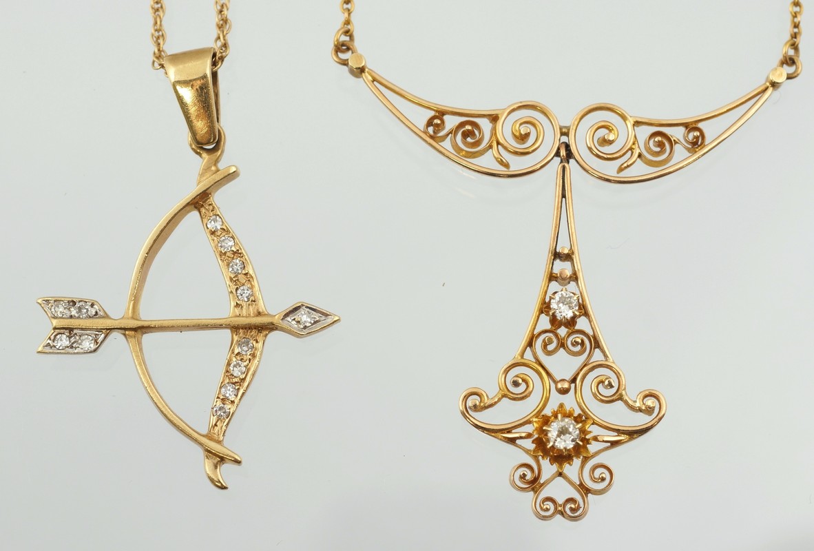 Appraisal: K YG necklace pendants cupids bow filigree pendant both w