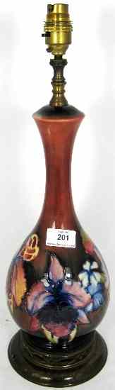 Appraisal: Moorcroft Large Flambe Lamp Base decorated in the Orchid Design