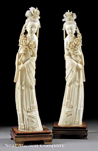 Appraisal: A Pair of Chinese Carved Ivory Figures of Guanyin each