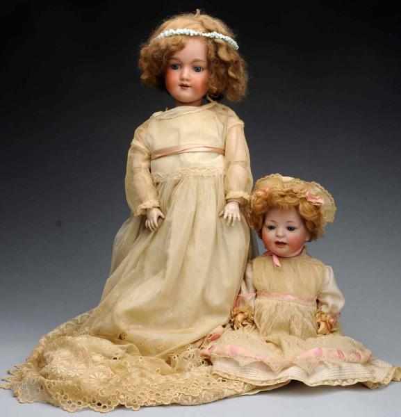 Appraisal: Lot of German Bisque Dolls Bisque socket head inset glass