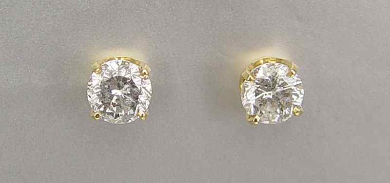 Appraisal: K CTW DIAMOND EARRINGS K yellow gold earrings contain two