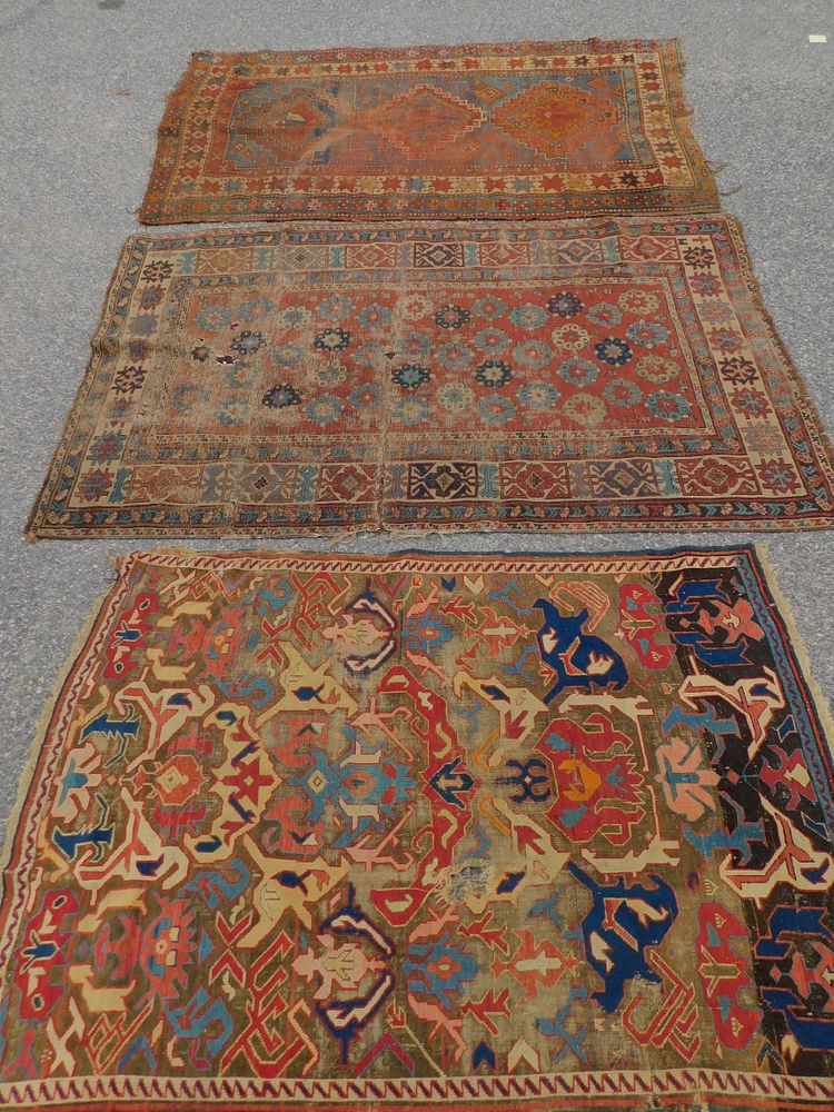 Appraisal: ANTIQUE CAUCASIAN RUGS Lot of antique Caucasian scatter rugs as