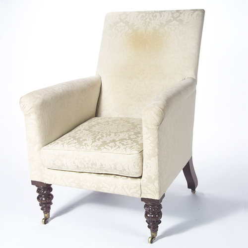 Appraisal: Victorian upholstered library chair with rolled arms drop-in seat cushion