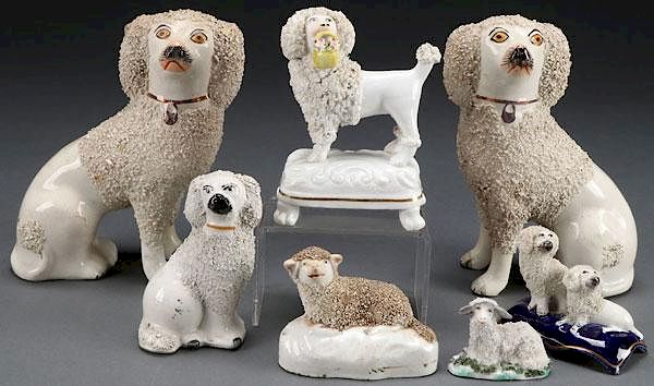 Appraisal: STAFFORDSHIRE DOG AND ANIMAL FIGURES SEVEN STAFFORDSHIRE POTTERY DOG AND