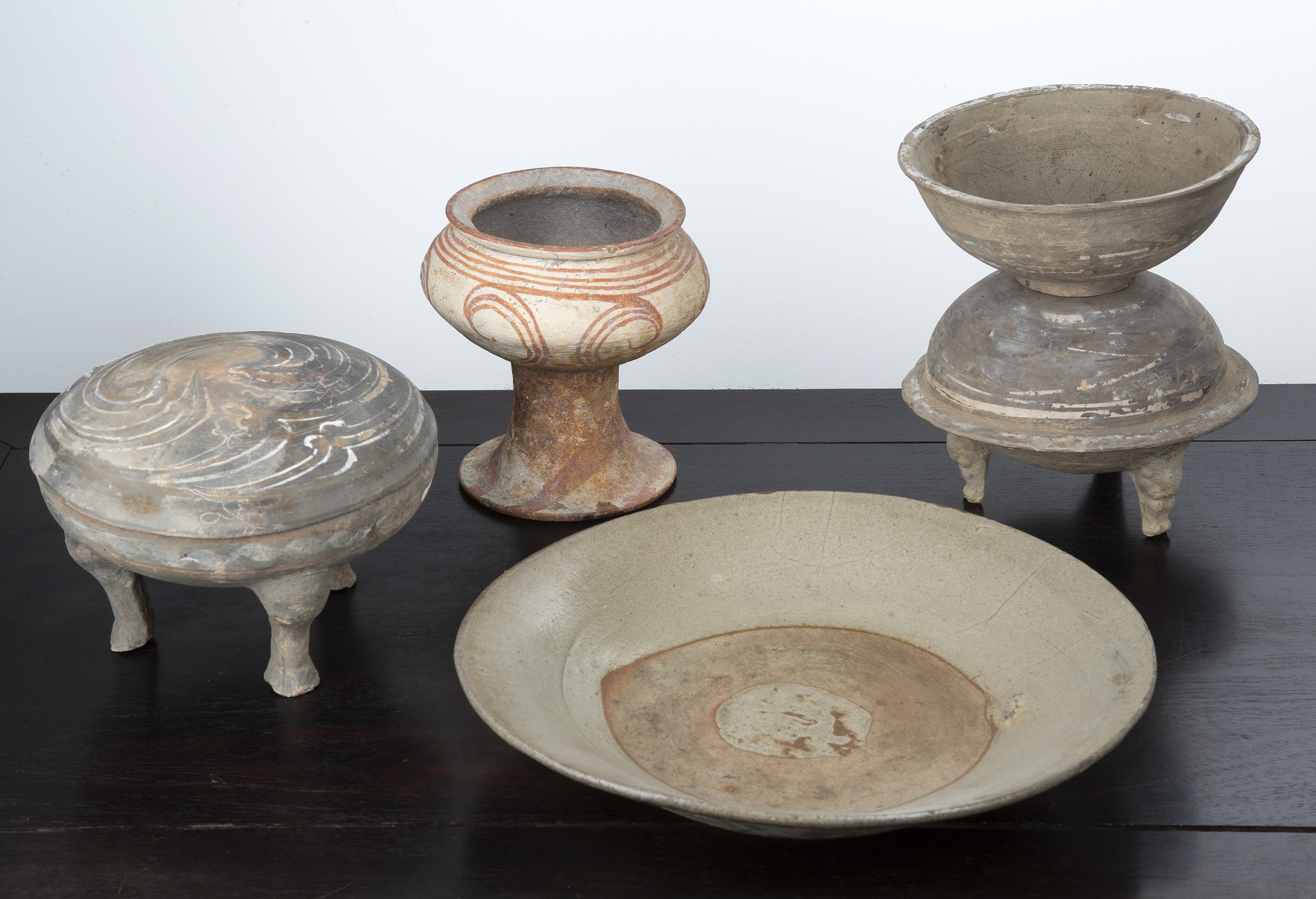 Appraisal: Group of early potteryChinese Han period to include a painted