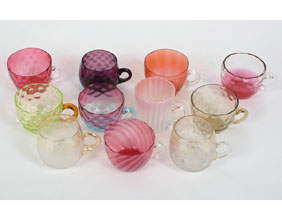 Appraisal: Collection of early glass handled punch cups blown thumbprint and