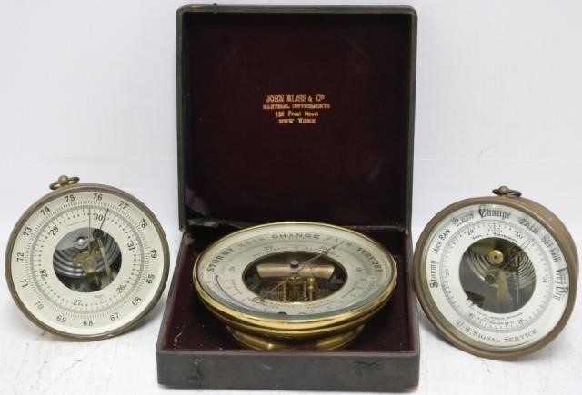 Appraisal: ROUND BRASS BAROMETERS MARKED TAYLOR DIAMETER MARKED PAUL A MEYROWITZ