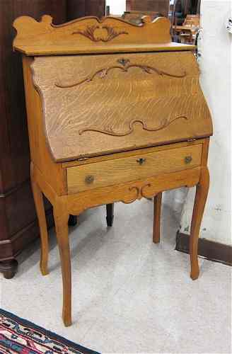 Appraisal: AN OAK SLANT-FRONT WRITING DESK American late th century the