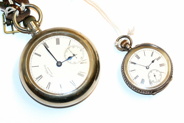 Appraisal: A RAILWAYMANS POCKET WATCH by Waltham with white enamel dial