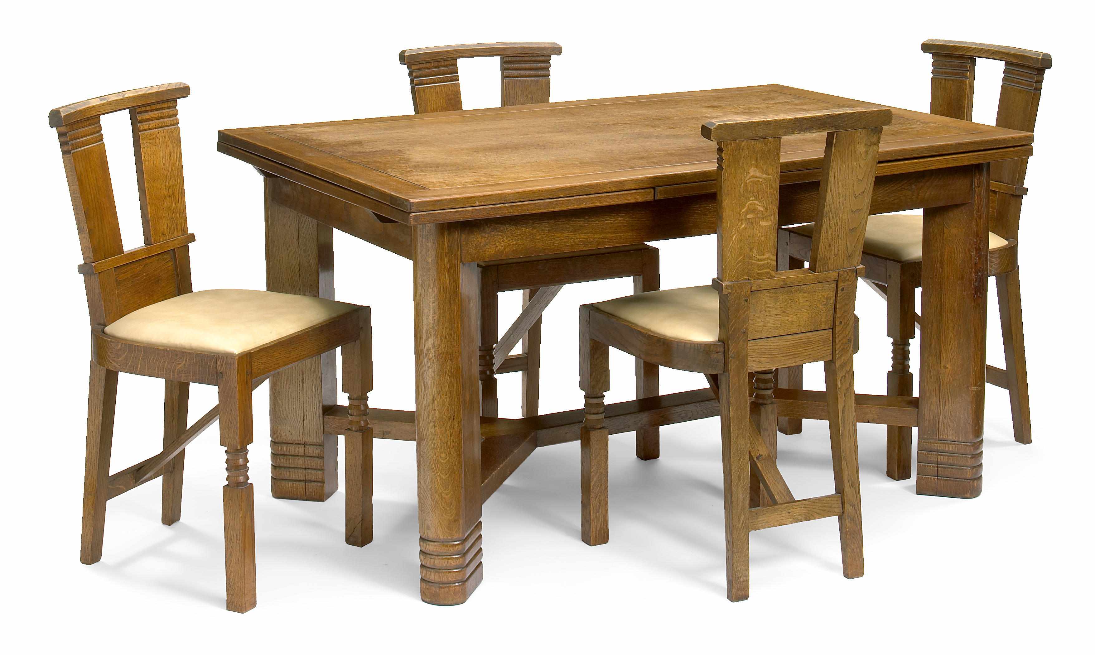 Appraisal: A Charles Dudouyt oak dining suite scomprising an extension table