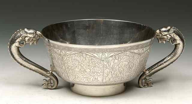 Appraisal: A CHINESE SILVER CIRCULAR BOWL of tapering form with dragon