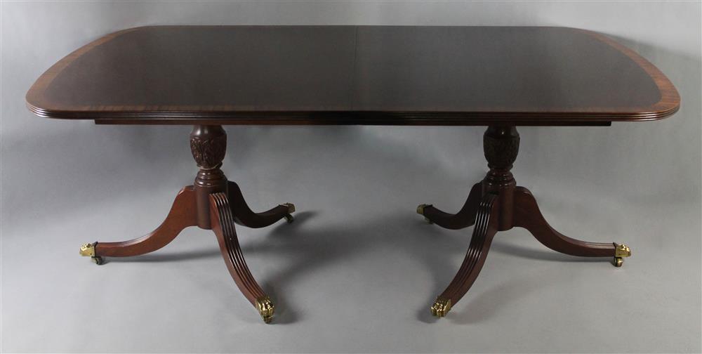 Appraisal: REGENCY STYLE DOUBLE PEDESTAL BANDED MAHOGANY DINING TABLE WITH TWO