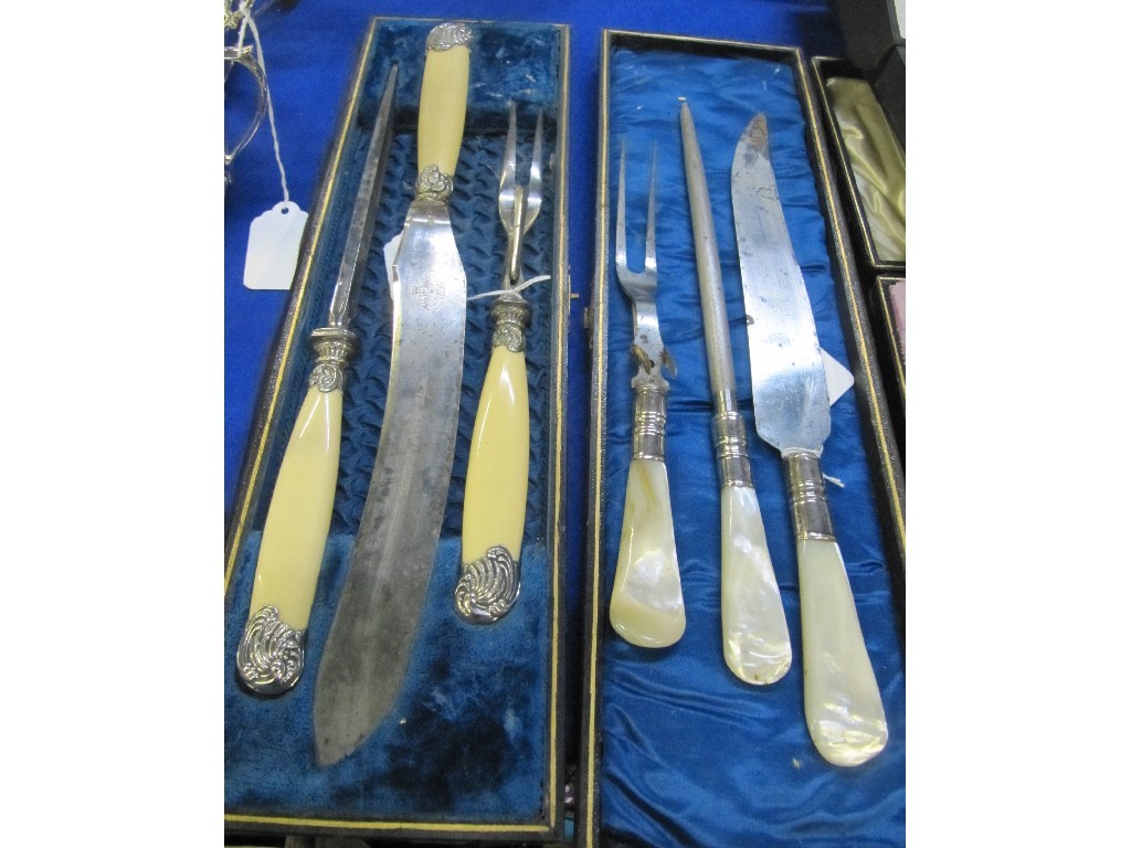 Appraisal: Lot comprising two three piece carving sets - one cased