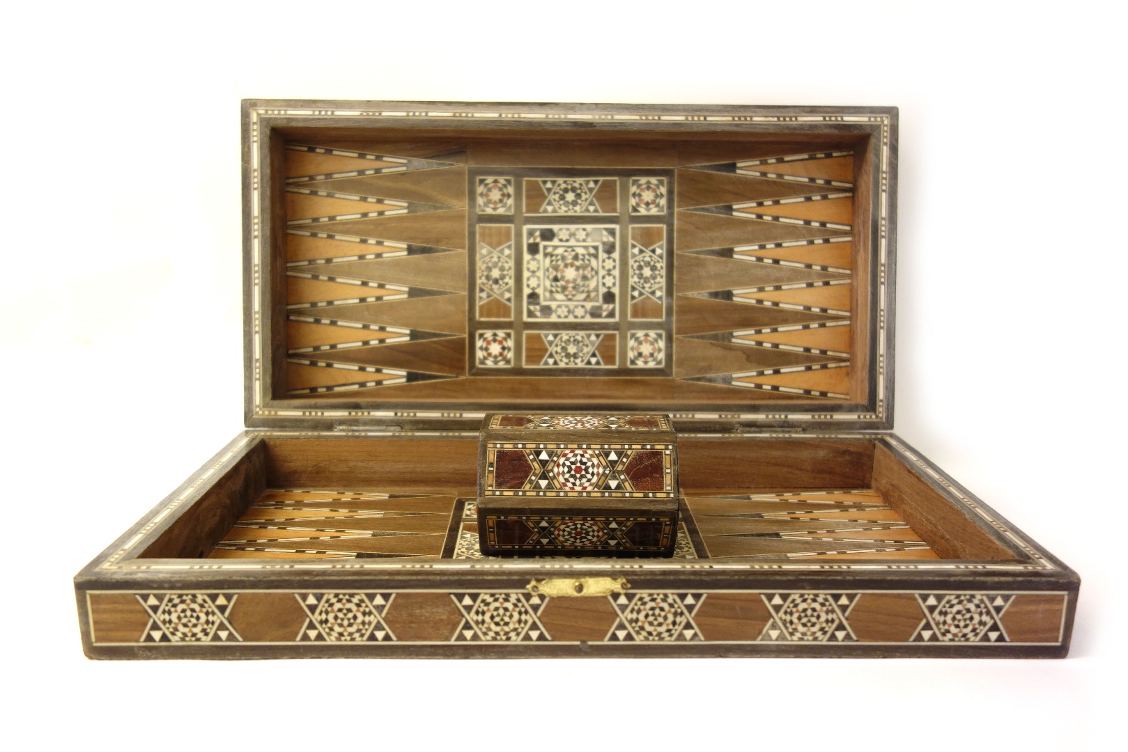 Appraisal: A Damascus ware folding backgammon games board inlaid with different