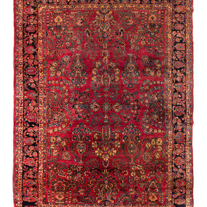 Appraisal: A Sarouk Wool Rug Circa feet inches x feet inches