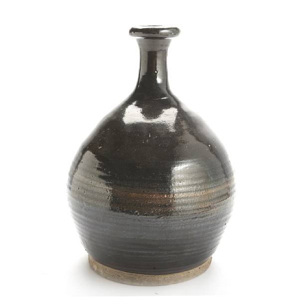 Appraisal: A Japanese temmoku glazed stoneware storage bottle height in diameter