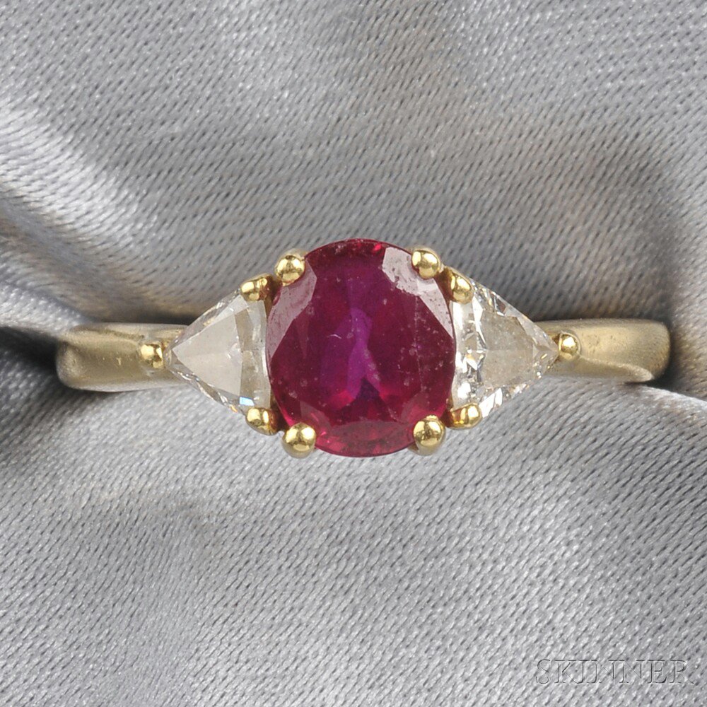 Appraisal: kt Gold Ruby and Diamond Ring prong-set with an oval-cut