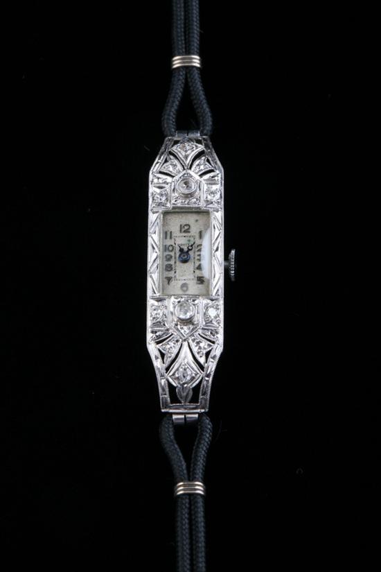 Appraisal: LADY'S ART DECO PLATINUM AND DIAMOND WRISTWATCH Delicately chased and