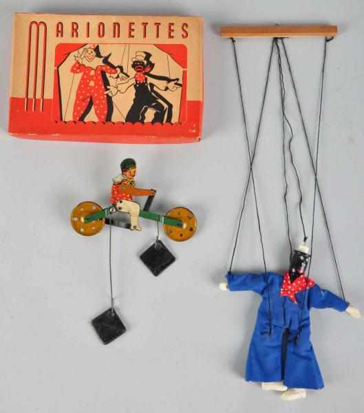 Appraisal: Lot of Early Tin Wood Toy Items American Includes one